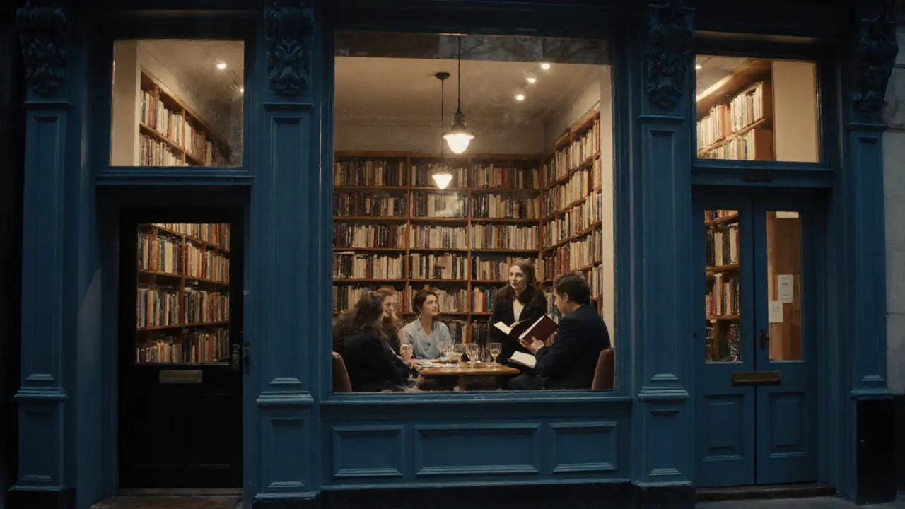 An intimate author talk in a candlelit bookstore with listeners seated in quiet attention.