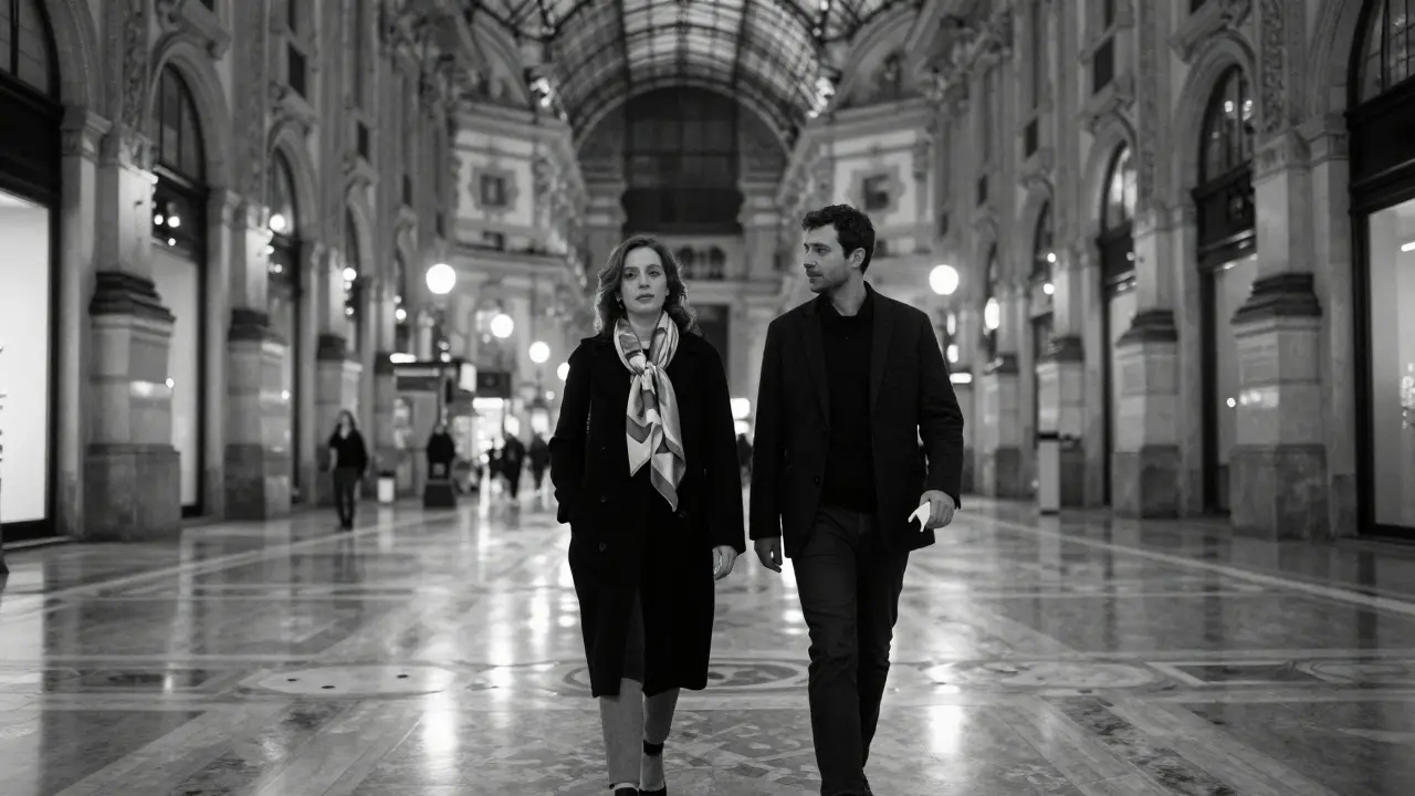 A quiet nighttime walk through Galleria Vittorio Emanuele II, two figures walking in dignified silence.