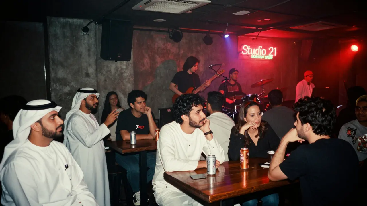 Underground rock bar with a live band and young crowd in dim, flickering red lighting.